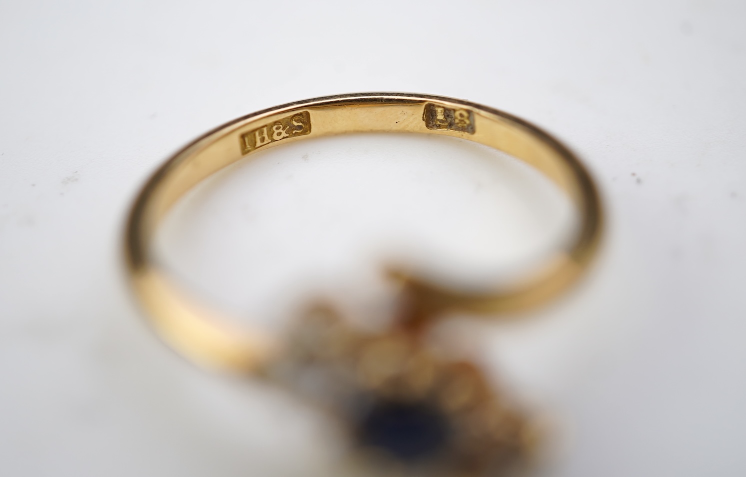A sapphire and diamond three-stone ring, early 20th century